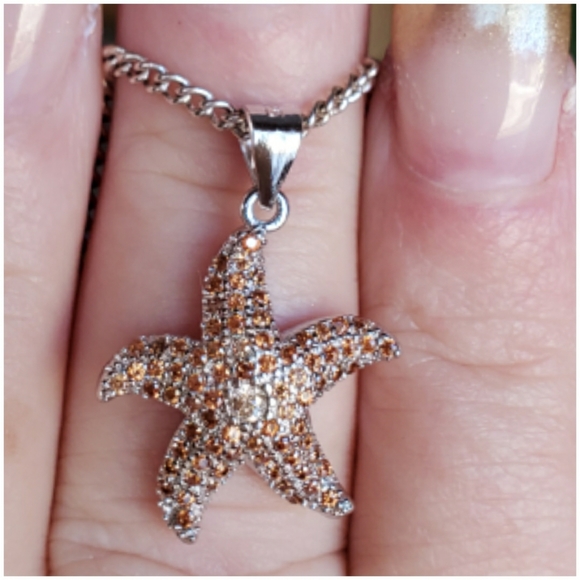 Jewelry - Genuin Golden Papadashra Sapphire Starfish Pendant